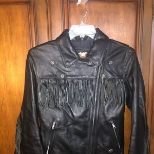 Women’s Harley Davidson leather riding jacket is size Med, with leather fringe.